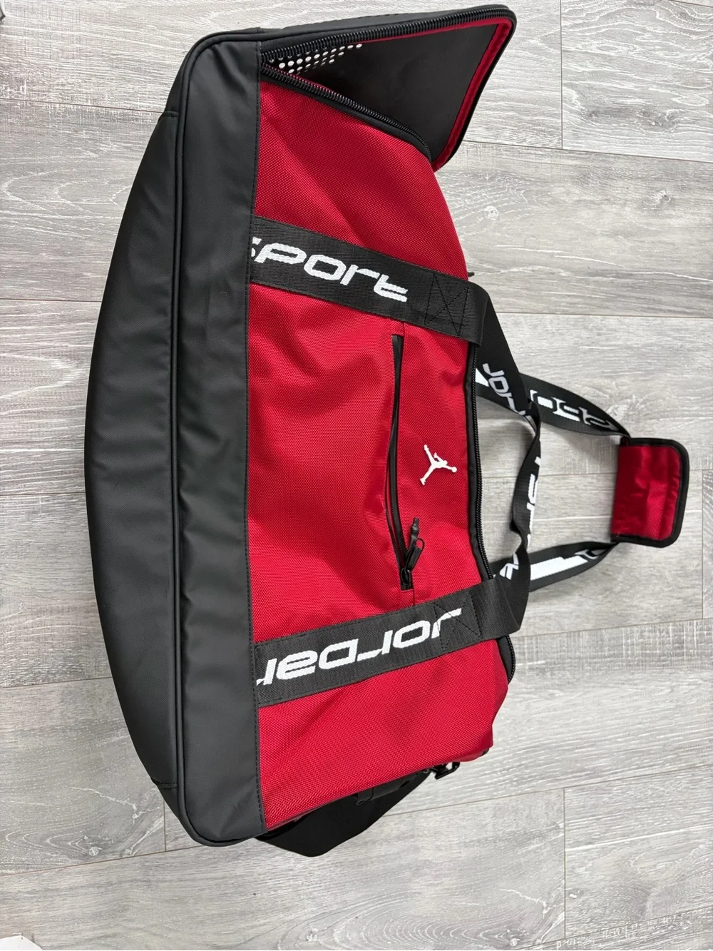 Jordan Red Duffel Bag with Black Straps